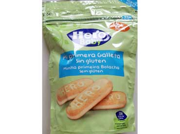 Hero Baby Mijn eerste koekje glutenvrij 25500. Ingredienten: Maiszetmeel, Zonnebloemolie, mager melkpoeder, emulgator (zonnebloemlecithine), natuurlijke aroma's, 
						 rijsmiddelen (natriumbicarbonaat en ammoniumbicarbonaat), vitamine B1. Kan sporen van ei en soja bevatten.