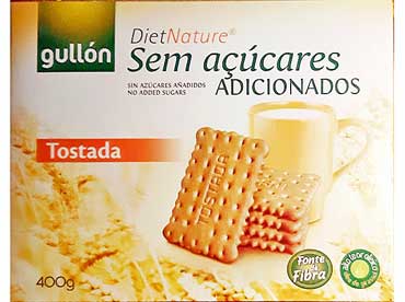 Tostada natuur koekjes 40016. Ingredienten: Tarwemeel 66%, Zoetstof maltitol, zonneblemolie met een hoog oliezuurgehalte 9,5%, voedingsvezel, gemoute, tarwebloem, 
						rijsmiddel (natriumbicarbonaat en ammoniumzuurcarbonaat), emulgator (soja-lecithine), vanille aroma, antioxidant Metabifliet. Kan deeltjes van noten en melk bevatten.